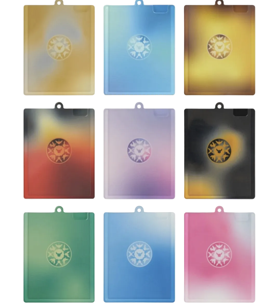 Nine translucent rectangular card-like pieces arranged in a 3x3 grid on a white background, each with a small hanging loop at the top and a circular star-like emblem near the center. The pieces show different color combinations and gradients, including gold, blue, yellow, red, purple, black, green, and pink.