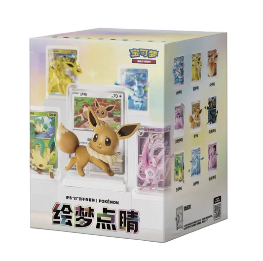A Pokémon trading card display box featuring Eevee on the front, with multiple illustrated card examples and Chinese text, photographed on a clean white background.